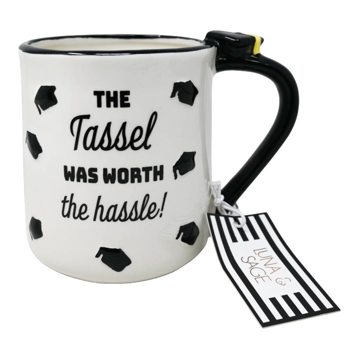 CERAMIC WHT THE TASSEL WAS WORTH THE HASSEL EMBOSSED MUG LUNA & SAGE C/P 18