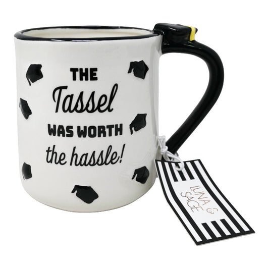 CERAMIC WHT THE TASSEL WAS WORTH THE HASSEL EMBOSSED MUG LUNA & SAGE C/P 18