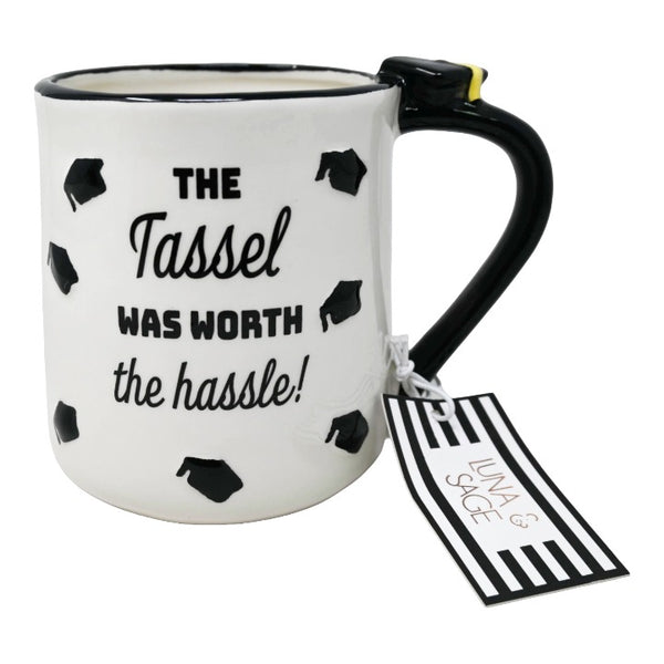 CERAMIC WHT THE TASSEL WAS WORTH THE HASSEL EMBOSSED MUG LUNA & SAGE C/P 18