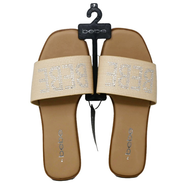 WOMEN TAN SANDAL wTRANSLUCENT UPPER & RUBBER LOGO PATCH BEBE 6-ASST C/P 12